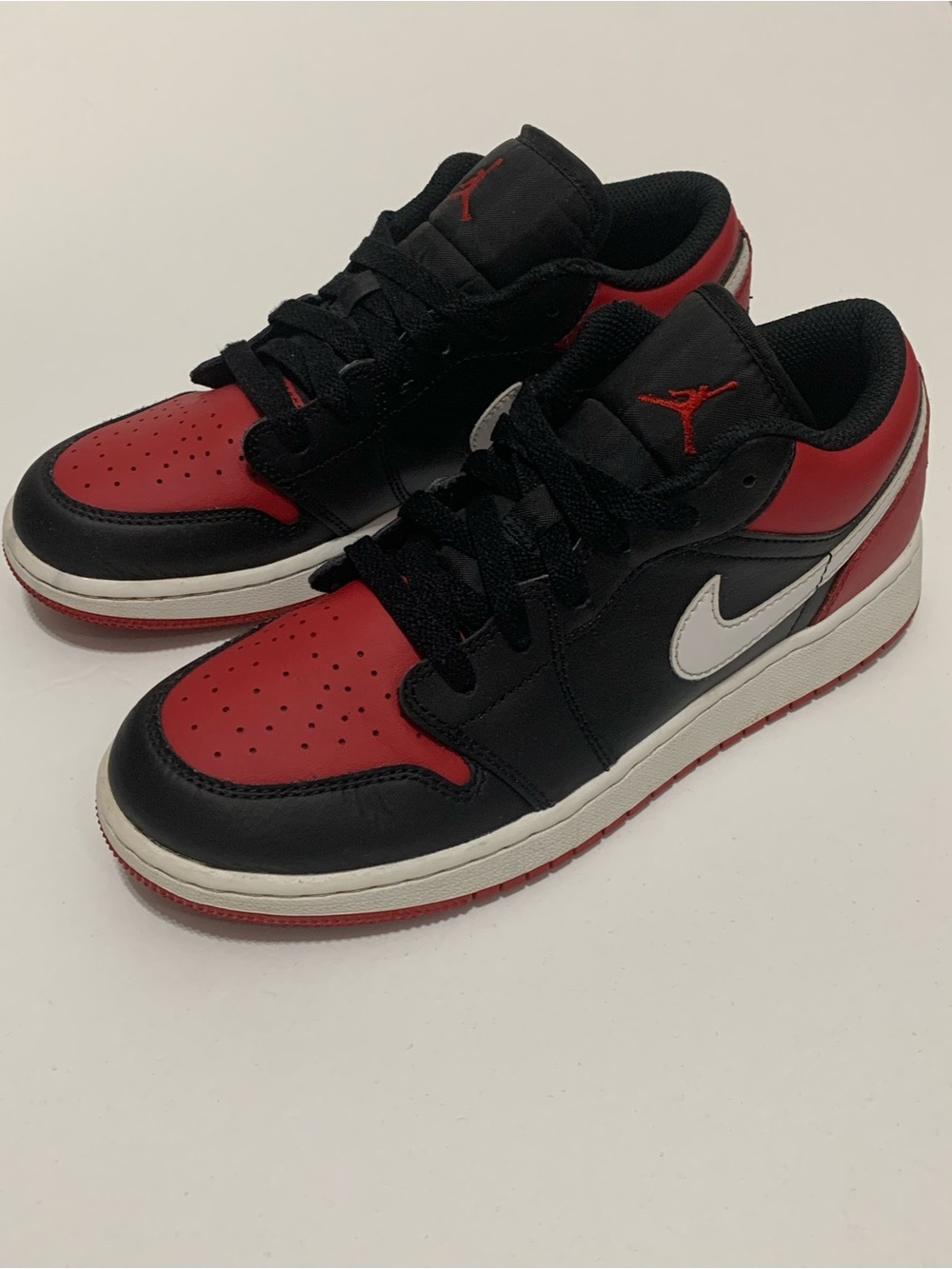 Jordan Low-Top Sneakers in Black, Red & White